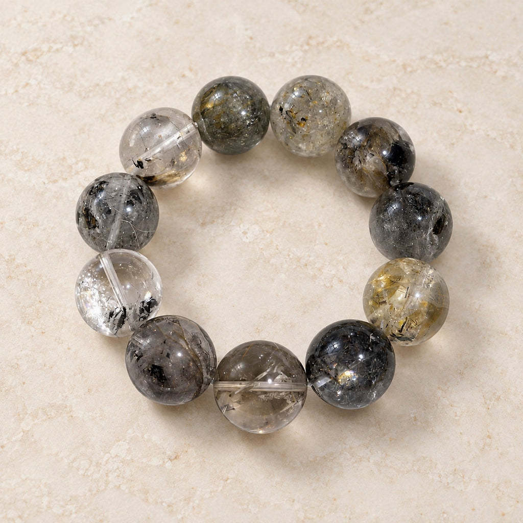 Natural Crystal Bracelet #02 — Smoky Garden — clear front product view on warm ivory background