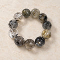 Natural Crystal Bracelet #02 — Smoky Garden — clear front product view on warm ivory background