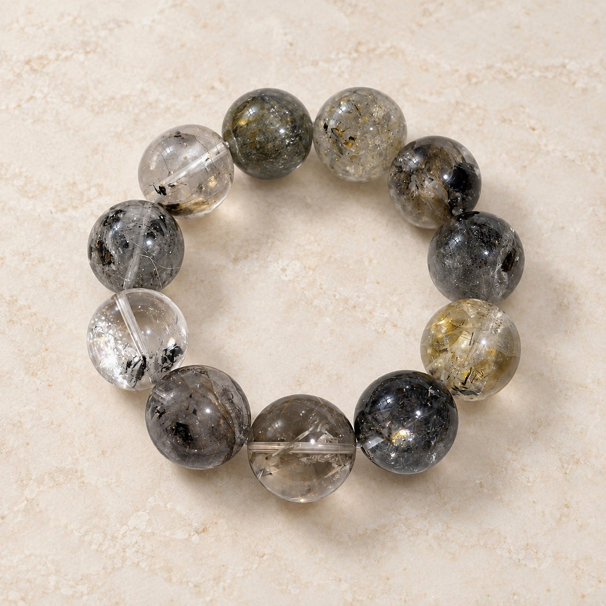 Natural Crystal Bracelet #02 — Smoky Garden — clear front product view on warm ivory background