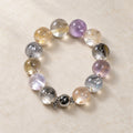 Natural Crystal Bracelet #04 — Golden Mist — clear front product view on warm ivory background
