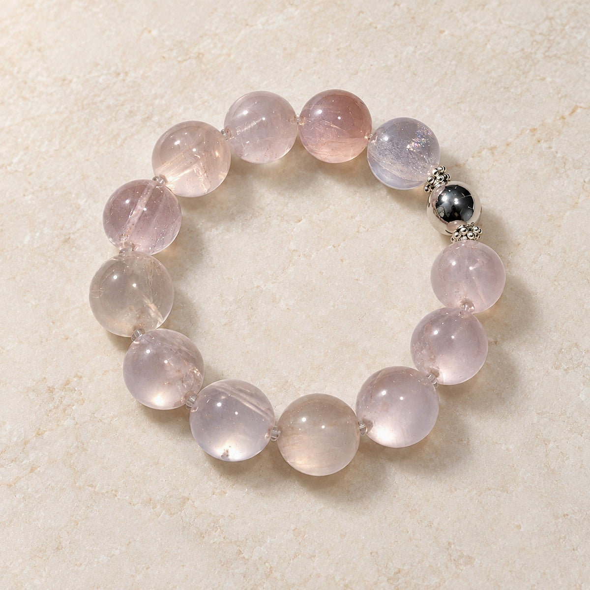 Natural Crystal Bracelet #06 — Soft Rose — clear front product view on warm ivory background