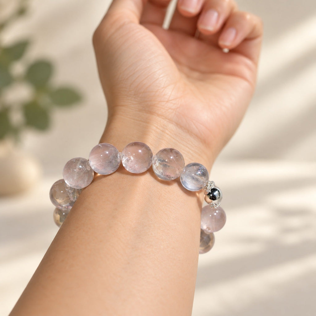 Natural Crystal Bracelet #06 — Soft Rose — styled on a woman's wrist