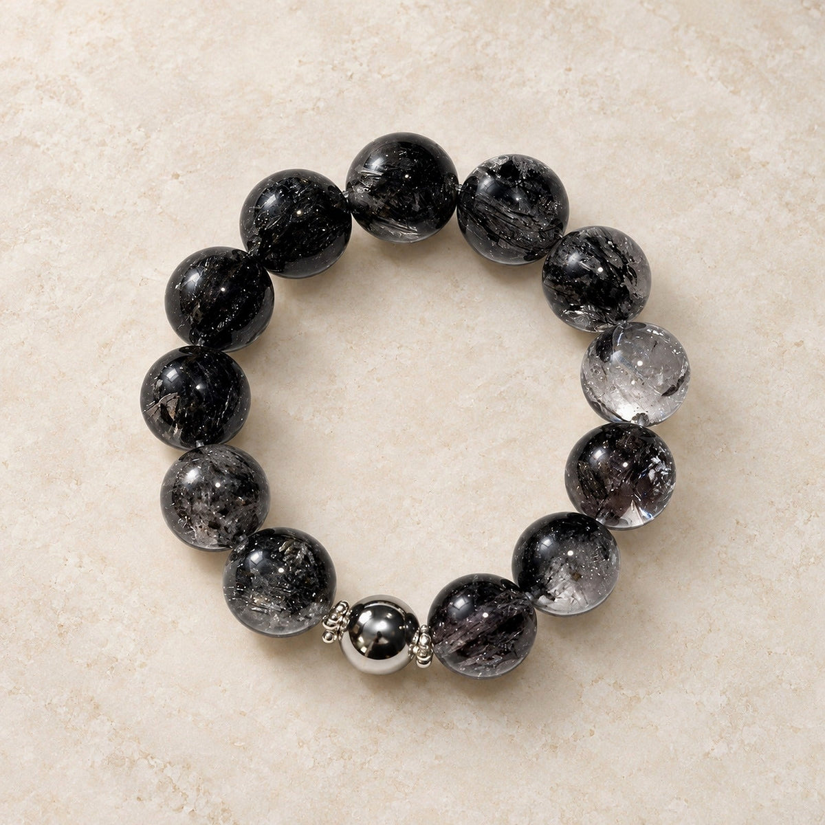 Natural Crystal Bracelet #08 — Midnight Veil — clear front product view on warm ivory background