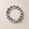 Natural Crystal Bracelet #10 — Lavender Smoke — clear front product view on warm ivory background